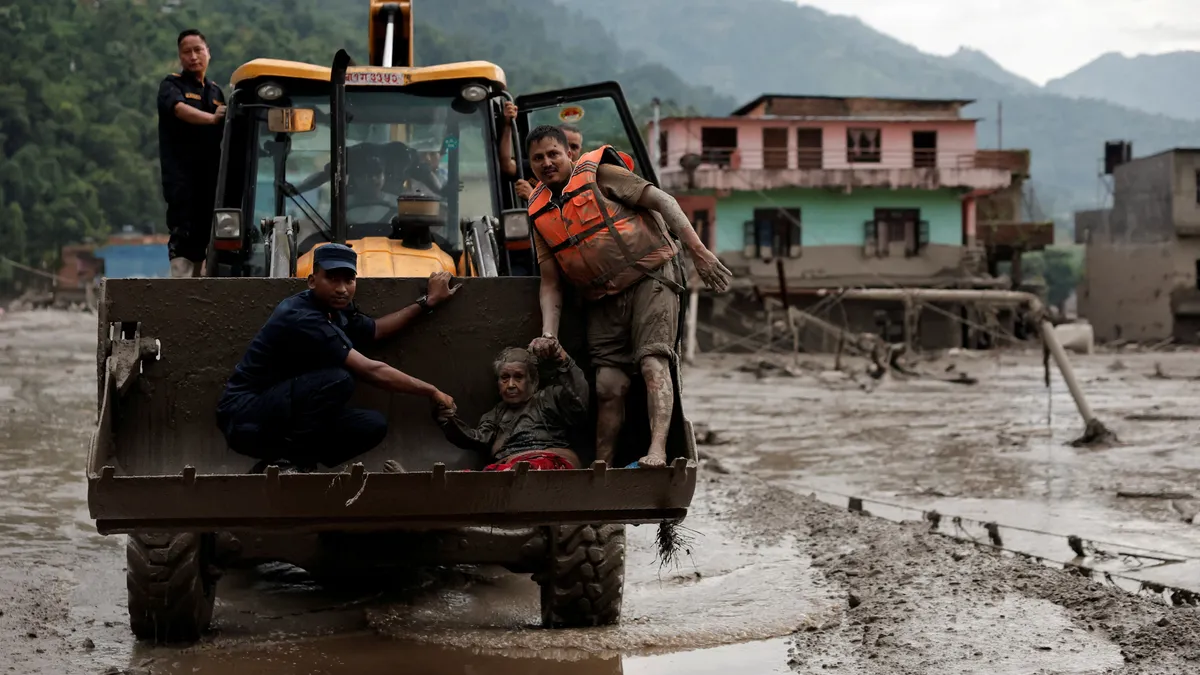 91471232007-20260826-t-121407-z-1894624472-rc-2-a-6-na-5-owa-5-rtrmadp-3-nepalfloods