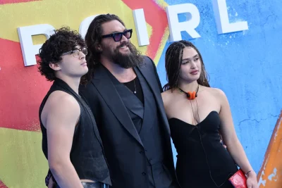 Jason Momoa attends ‘Supergirl’ London premiere with kids, girlfriend