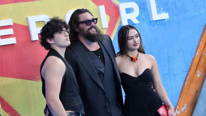 Jason Momoa attends ‘Supergirl’ London premiere with kids, girlfriend