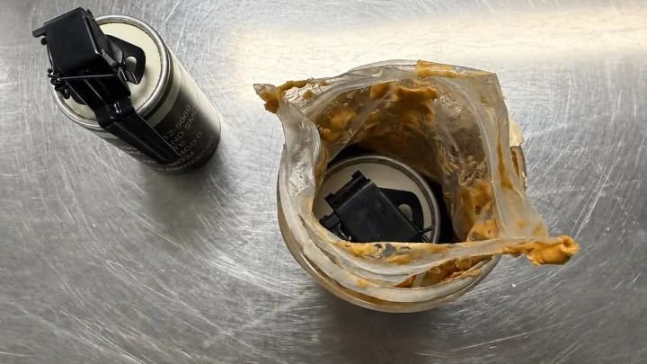 A traveler hid a smoke grenade in peanut butter. TSA found it